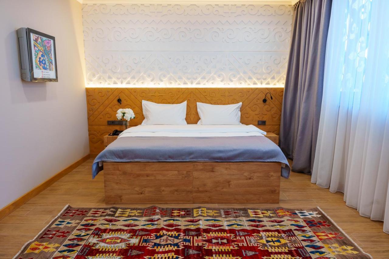 Dami Almaty Hotel Εξωτερικό φωτογραφία